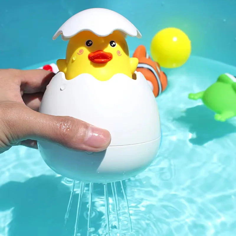 Adorable Water-Spraying Egg Toys: A Fun Duck & Penguin for Bath and Pool Time